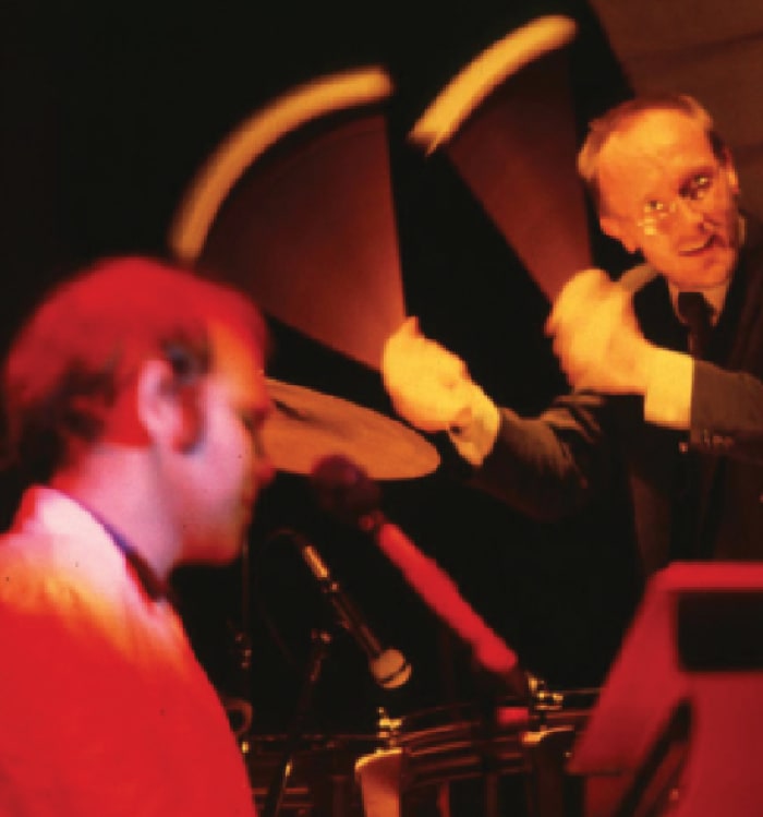 Elton John and Ray Cooper completely in sync while performing onstage. Photo by PATTI OUDERKIRK/WIREIMAGES.