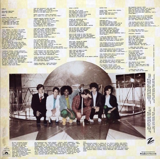 Back side of 1982 EP “I Could Rule the World If I Could Only Get the Parts” which opens with “Christmas Wrapping”