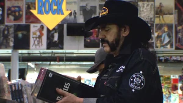 Lemmy loved The Beatles. A photo still of Motorhead's bassist browsing for Beatles albums at an Amoeba Records in the documentary "Lemmy." "The Beatles had an influence on everybody," he said.