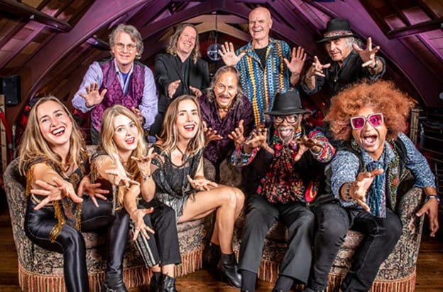 Moonalice photo by Bob Minkin, back row: Roger McNamee, Jason Crosby, John Molo and Pete Sears, middle: Barry Sless, front row: Chloe, Erika and Rachel Tietjen, Lester and Dylan Chambers