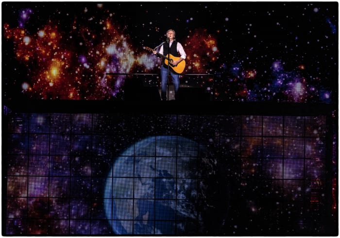 As McCartney played “Blackbird” solo on acoustic guitar, the part of the stage he was standing on began to rise, lifting him above the crowd, as the screens displayed pictures of a starlit sky and a dazzling full moon. © MPL Communications Ltd/ Photographer: MJ Kim.