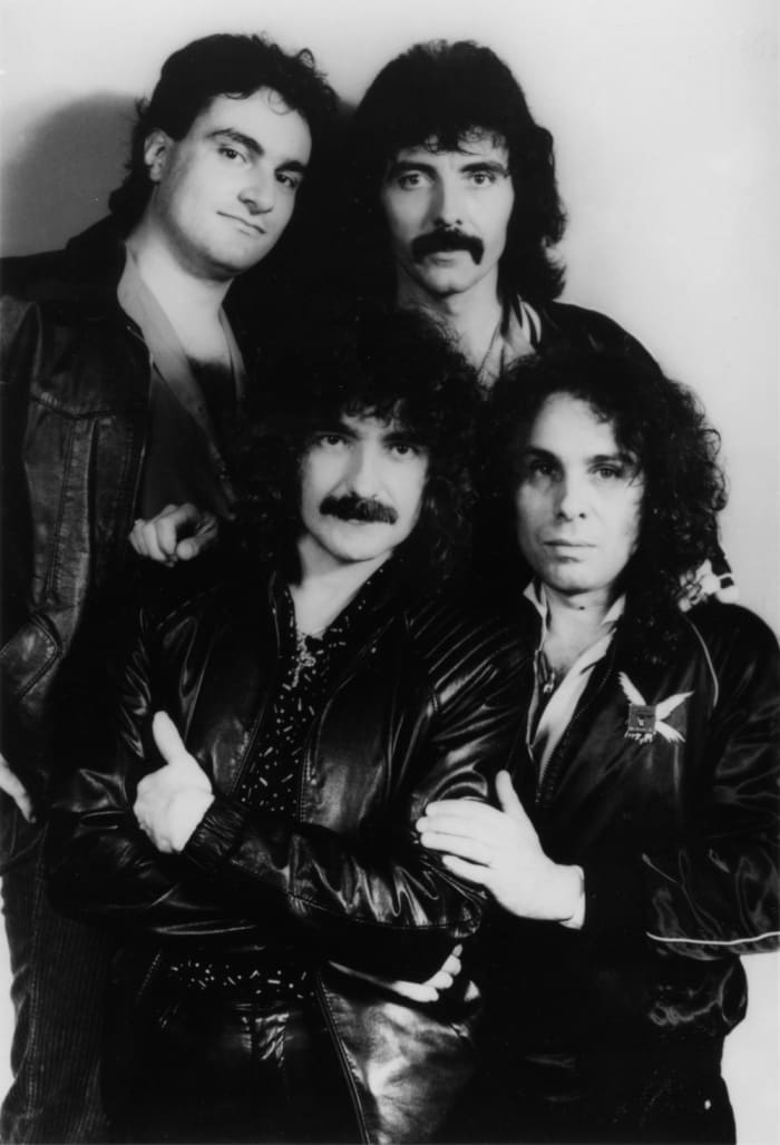 Black Sabbath (clockwise form bottom left): Geezer Butler, Vinny Appice, Tony Iommi and Ronnie James Dio. Photo by Mark Weiss.
