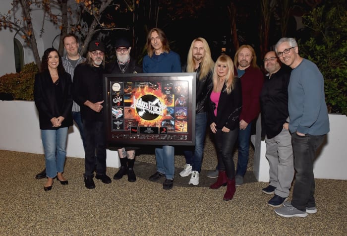 Judas Priest celebration (L-R): Jo Kalli (Sony Music UK), Scott Carter (Sony Music US), Glenn Tipton, Rob Halford, Scott Travis, Richie Faulkner,, Jayne Andrews (Manager), Ian Hill, Michael Closter and Scott Rubin (Reach Music Publishing).