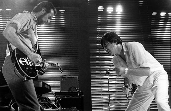 Phil Manzanera and Bryan Ferry of Roxy Music perform onstage on the Flesh And Blood Tour at Ahoy, Rotterdam, Netherlands, 7th June 1980.