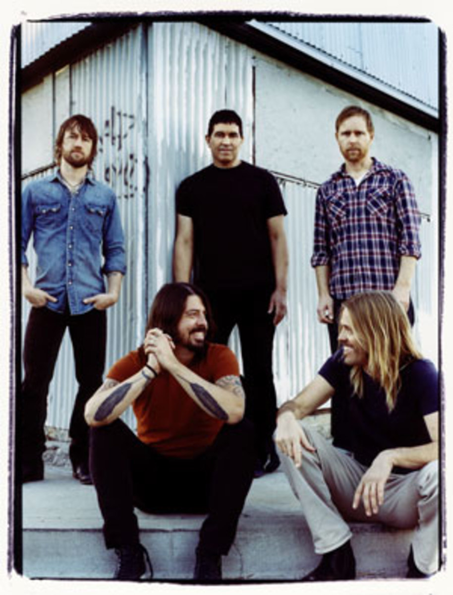 Foo Fighters features two Nirvana alumni: frontman Dave Grohl (front left) and guitarist Pat Smear (center back). Courtesy RCA/Steve Gullick