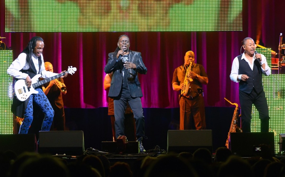Earth, Wind & Fire's current lineup features (foreground from left) founding members Verdine White, Philip Bailey and Ralph Johnson. (Photos by Chris M. Junior)