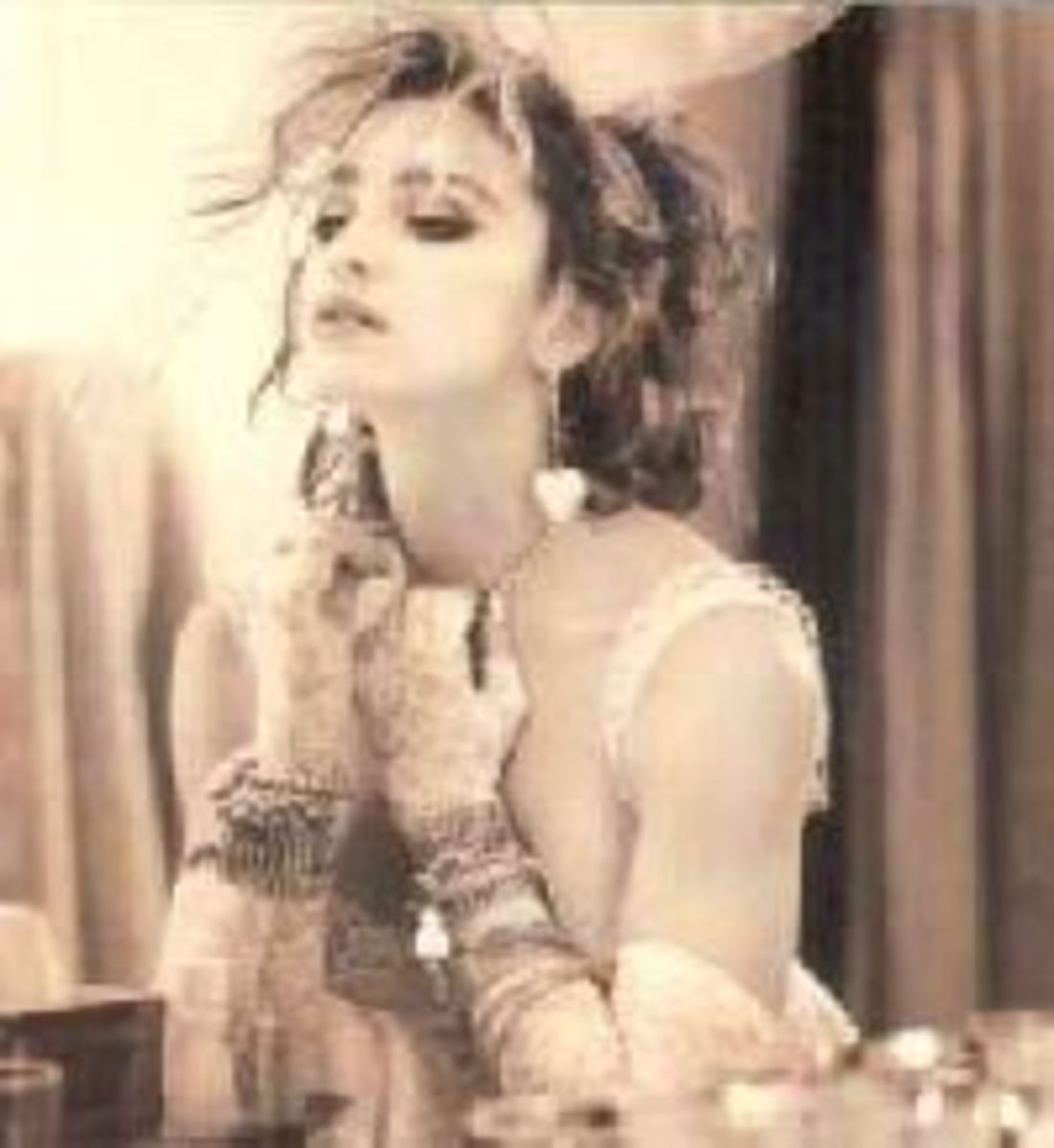 Madonna -sepia in wed dress