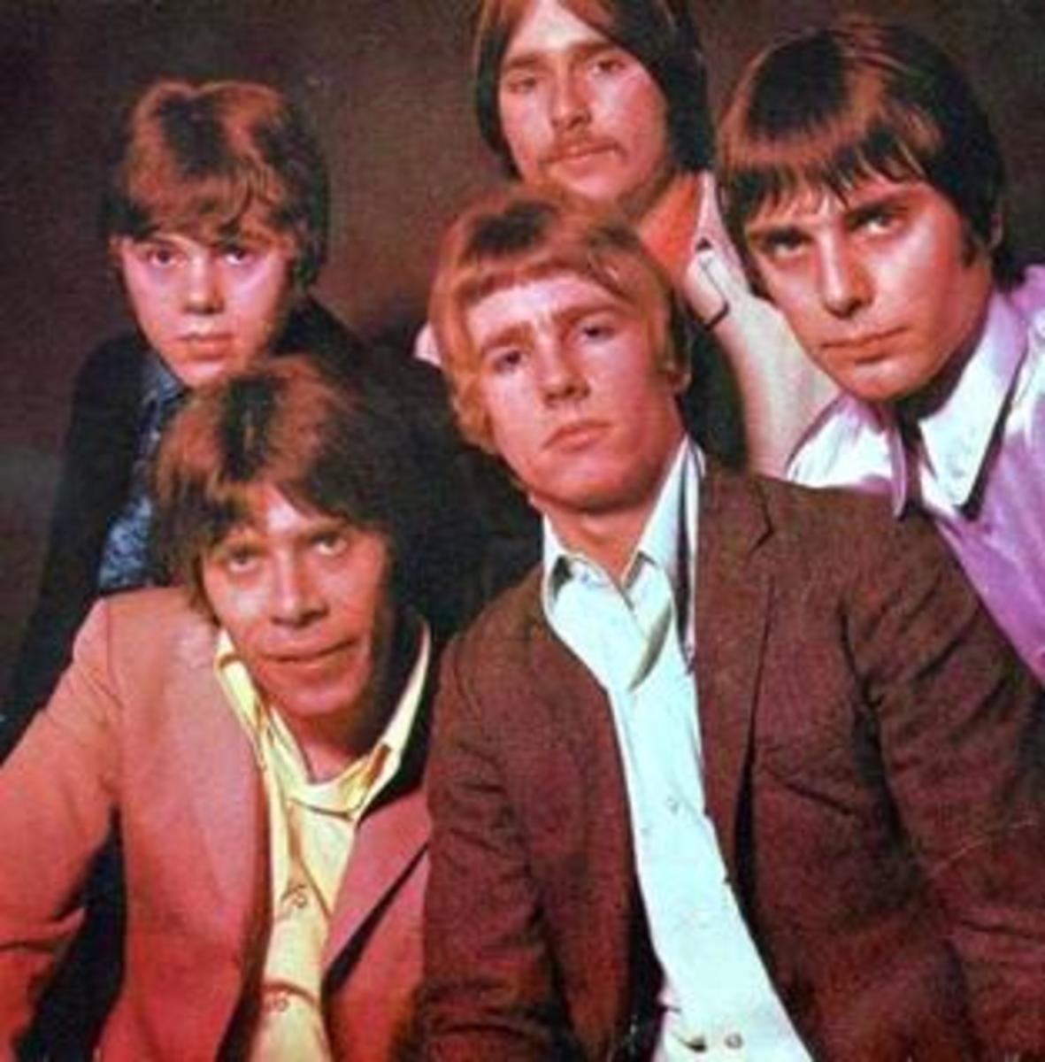 Status Quo in publicity photo (clockwise from top): Rossi, Coghlan, Parfitt, Lynes and Alan Lancaster.