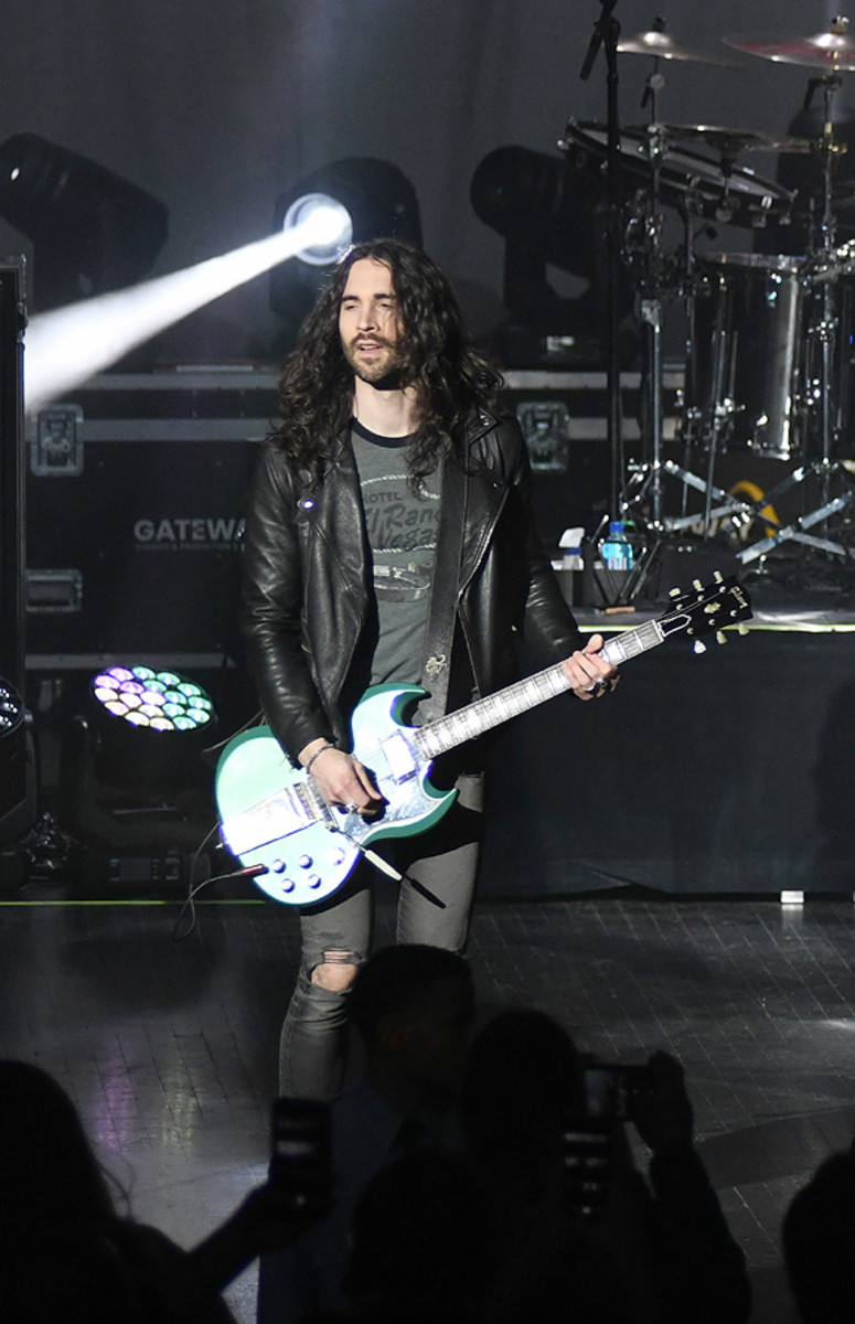 Guitarist Frank Sidoris interacting with the audience between songs.
