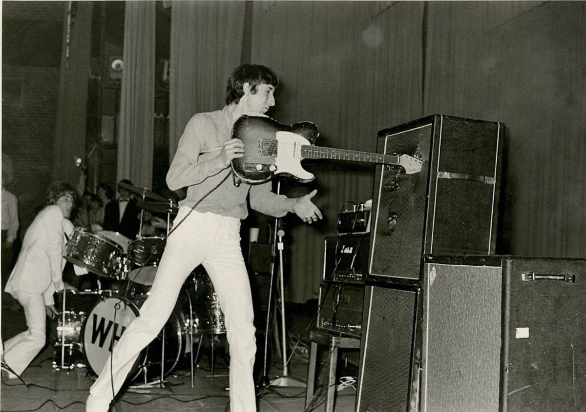 Pete Townshend of The Who smashes a Fender Telecaster guitar into the speaker cab of his amplifier during a concert at the Oberrheinhalle, Offenburg, Germany, 17th April 1967. Marshall amplifier heads are visible behind the speaker cabs and the guitar is fitted with a Fender Stratocaster neck. (Photo by Chris Moprhet/Redferns)
