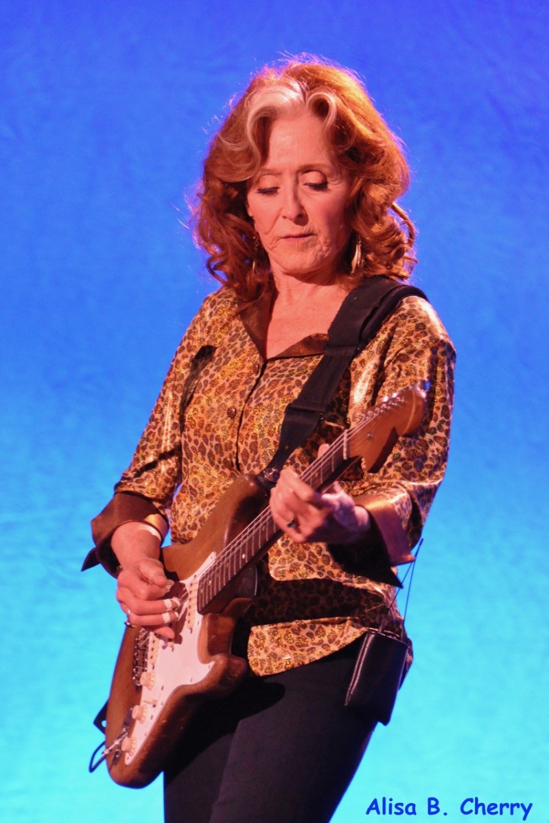 Bonnie Raitt's radiance and Lucinda Williams' determination make for a