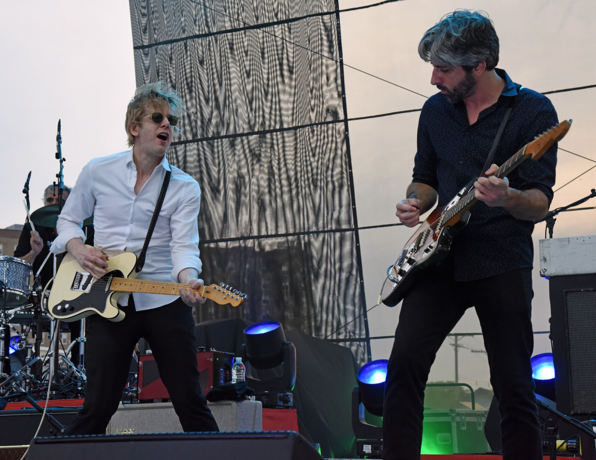 Spoon, led by singer-guitarist Britt Daniel (left), kept between-song banter to a minimum Aug. 25 at The Stone Pony Summer Stage in Asbury Park, New Jersey. (Photo by Chris M. Junior)